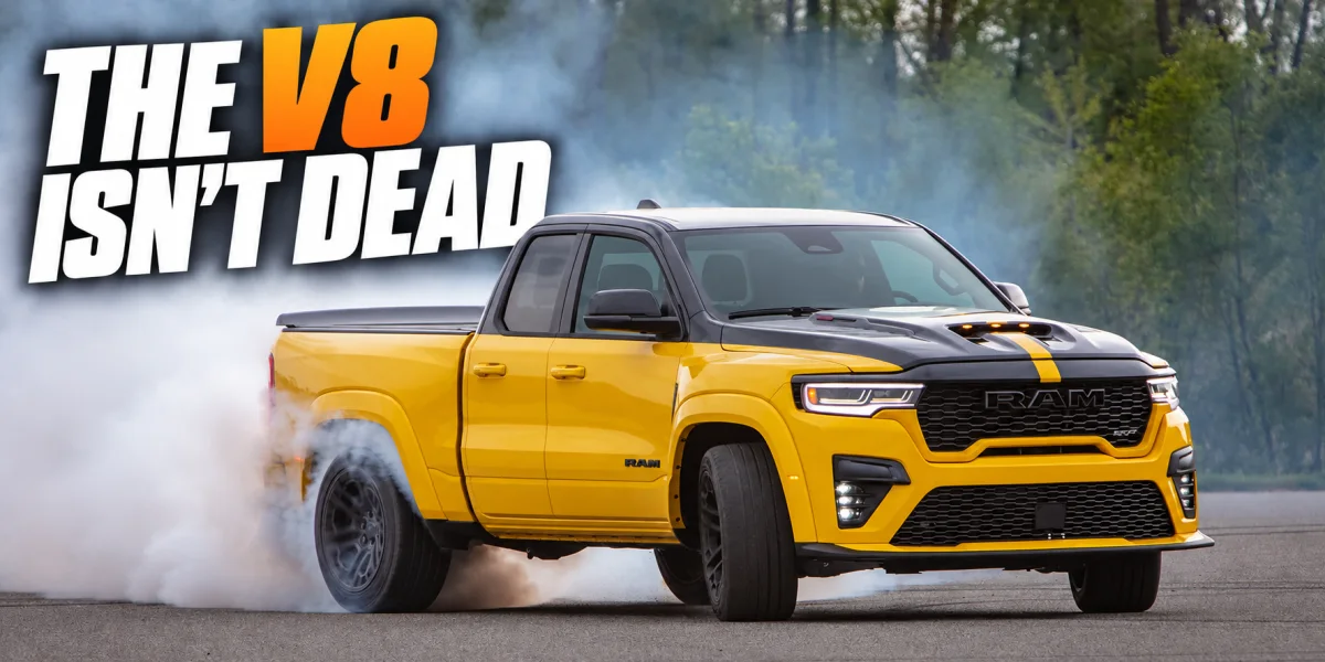 Yellow 2027 Ram 1500 Rumble Bee performing a smoky burnout on a closed track, captioned The V8 Isn't Dead